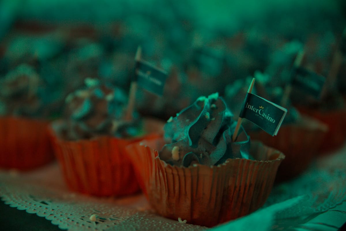 Mini chocolate cupcakes with business flags, Corporate Events Barcelona