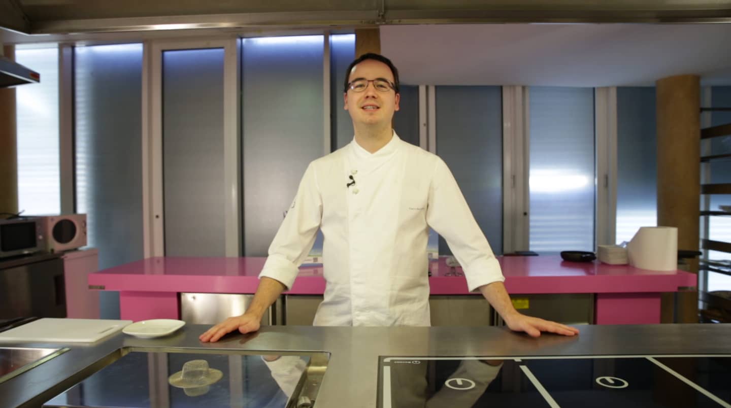 a cook in his modern kitchen talking into the camera, food show producing in barcelona