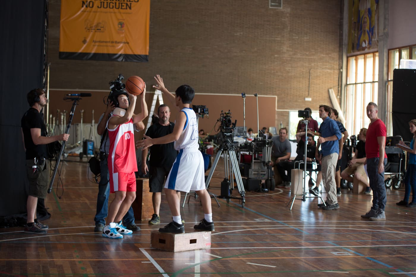 Video reportage of behind-the-scenes of basketball players playing ball