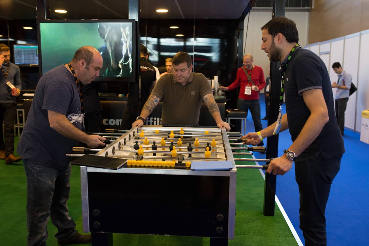 Men playing table football, iGaming 2014, Mode Media