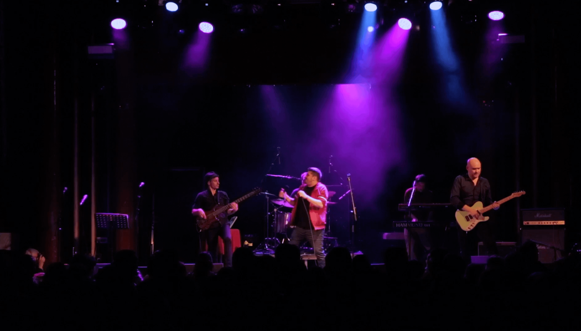 Musicians performing on stage