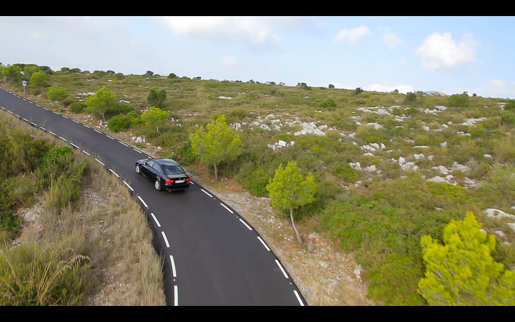 a car on the open road screenshot of a video production