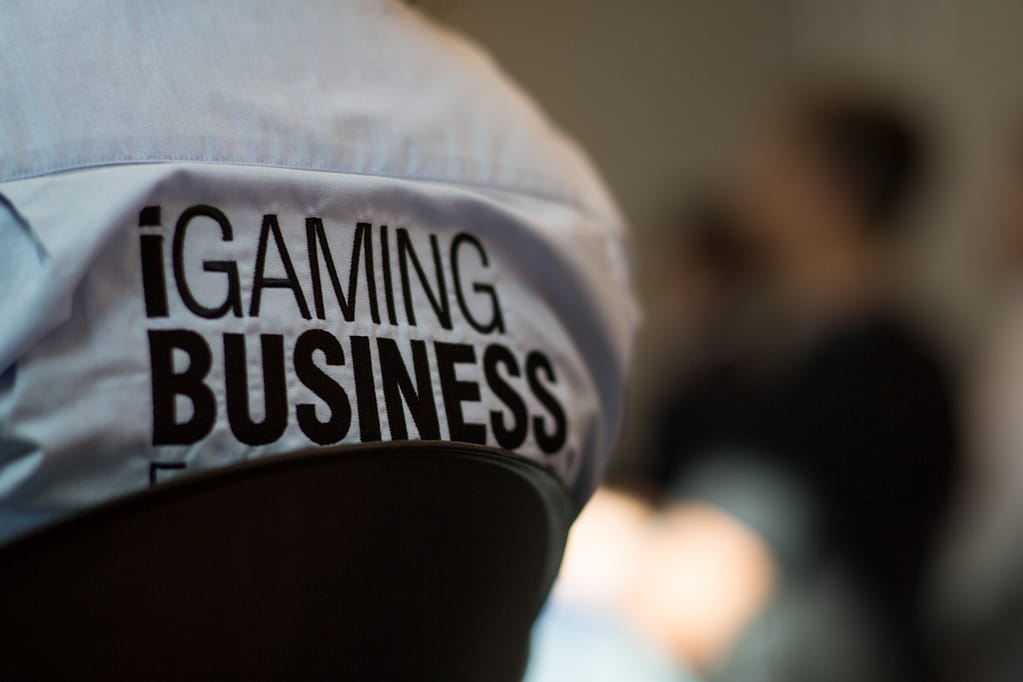Logo of iGaming conference shown behind a shirt, Photographers Advertising Barcelona