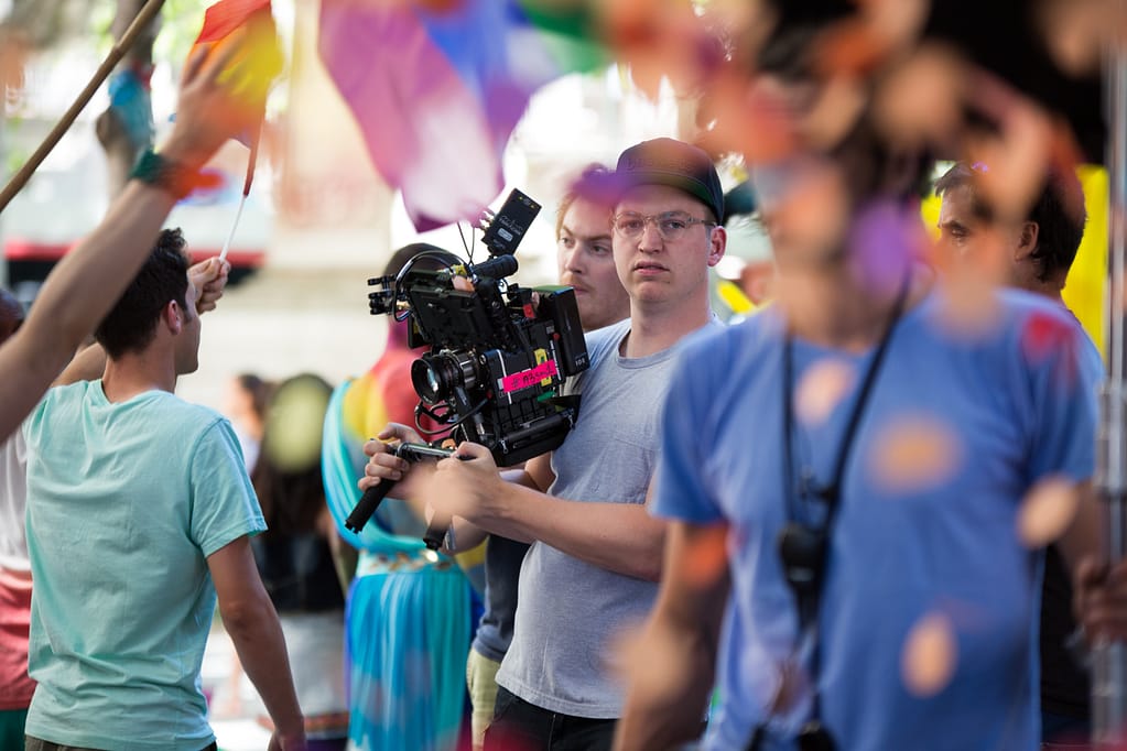 Cameraman filming LGBT Pride Festival in Barcelona
