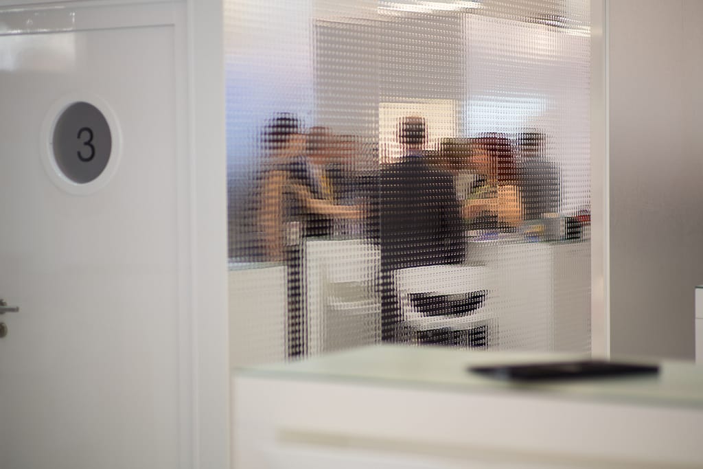 Blurry image of group of people at a table